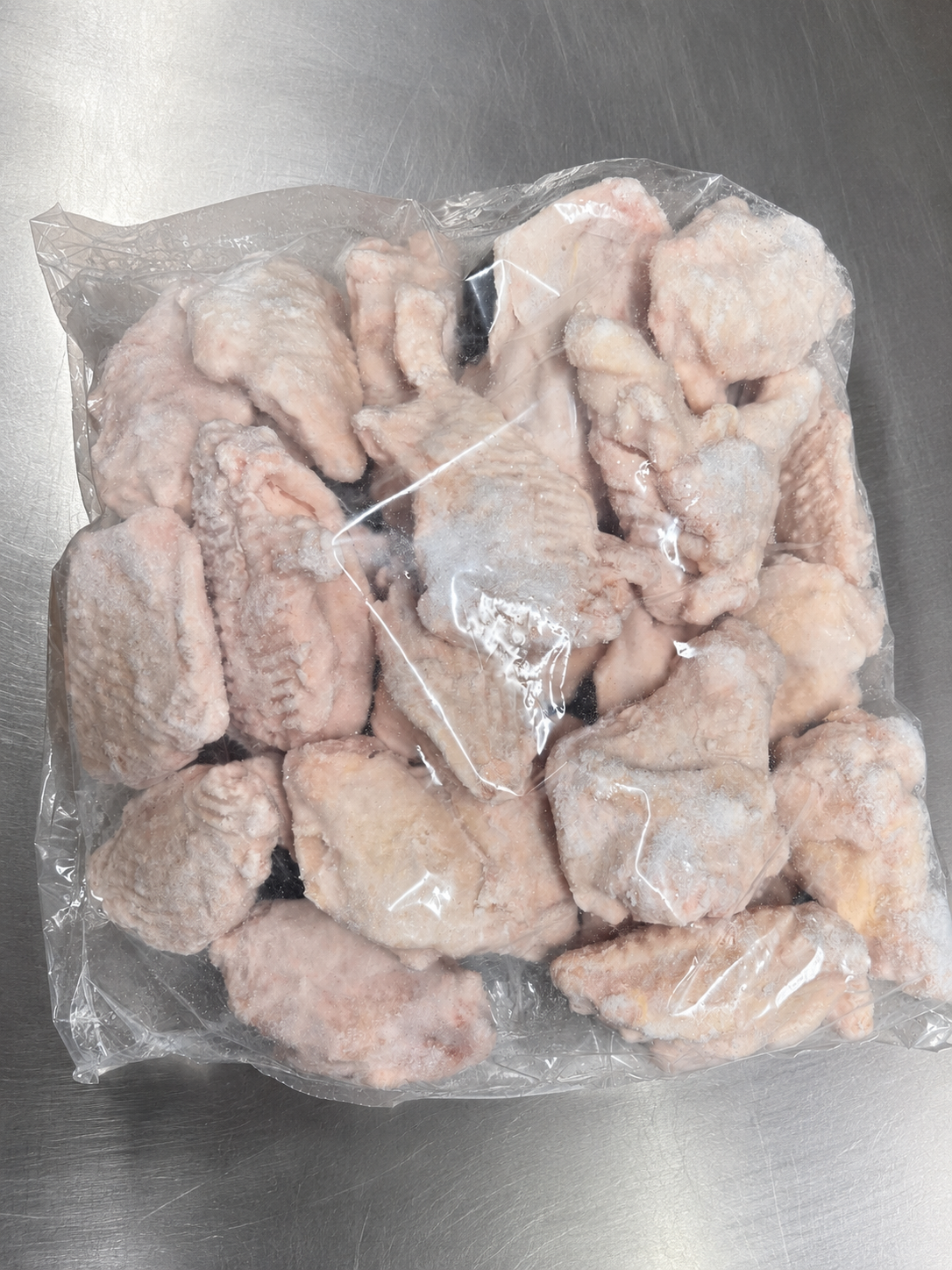 Raw Jumbo Chicken Wings w/ Buffalo Sauce